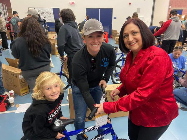 Supervisor Karen Spiegel volunteering at Bicycles for Children